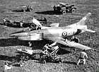 One of the most advantageous features of the G.91 as a tactical fighter is the ease with which it can be serviced in the field. The four 12.7mm Colt-Browning machine guns of this 5th Air Brigade machine have been removed from the aircraft complete with their ammunition containers and feed mechanism; the whole armament bay system is fixed to the inside of the fuselage panel and can be lifted out in one piece in a matter of minutes