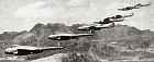 Echelon formation of No. 8 Squadron Vampire 9s in flight near Aden in 1954.